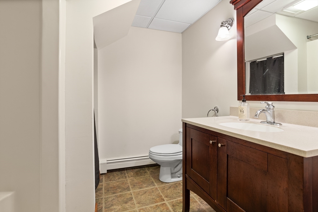 773 Great Road Stow, MA 01775 - Photo 27 of 37 a bathroom with a sink and a toilet