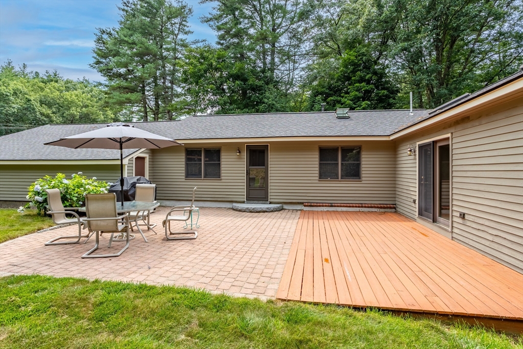 773 Great Road Stow, MA 01775 - Photo 29 of 37 a view of backyard with outdoor seating and plants