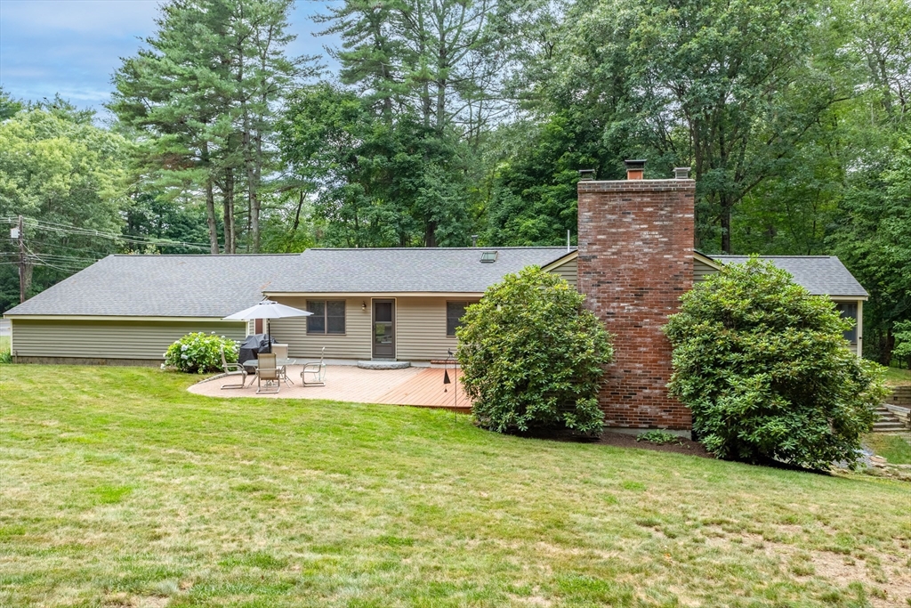 773 Great Road Stow, MA 01775 - Photo 30 of 37 a front view of a house with garden