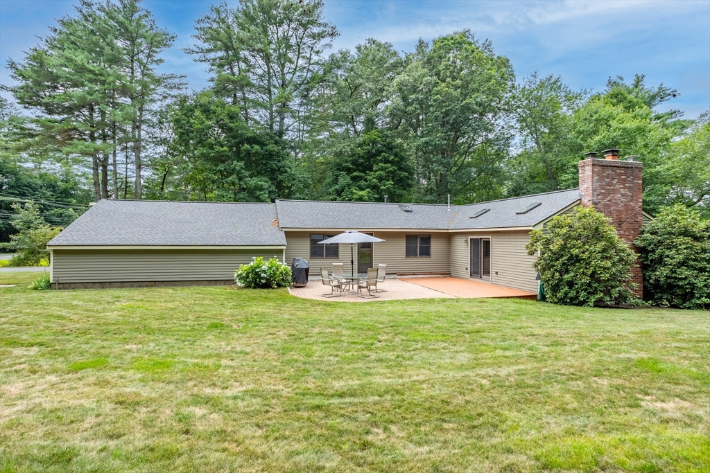 773 Great Road Stow, MA 01775 - Photo 31 of 37 a front view of a house with garden