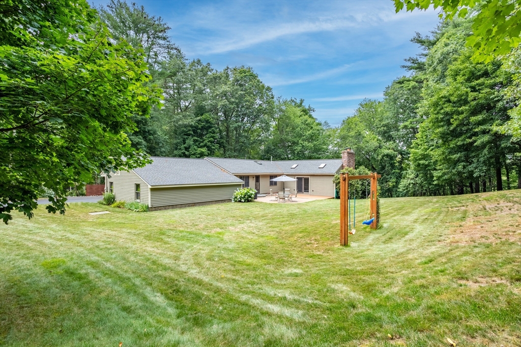 773 Great Road Stow, MA 01775 - Photo 32 of 37 a house view with a garden space