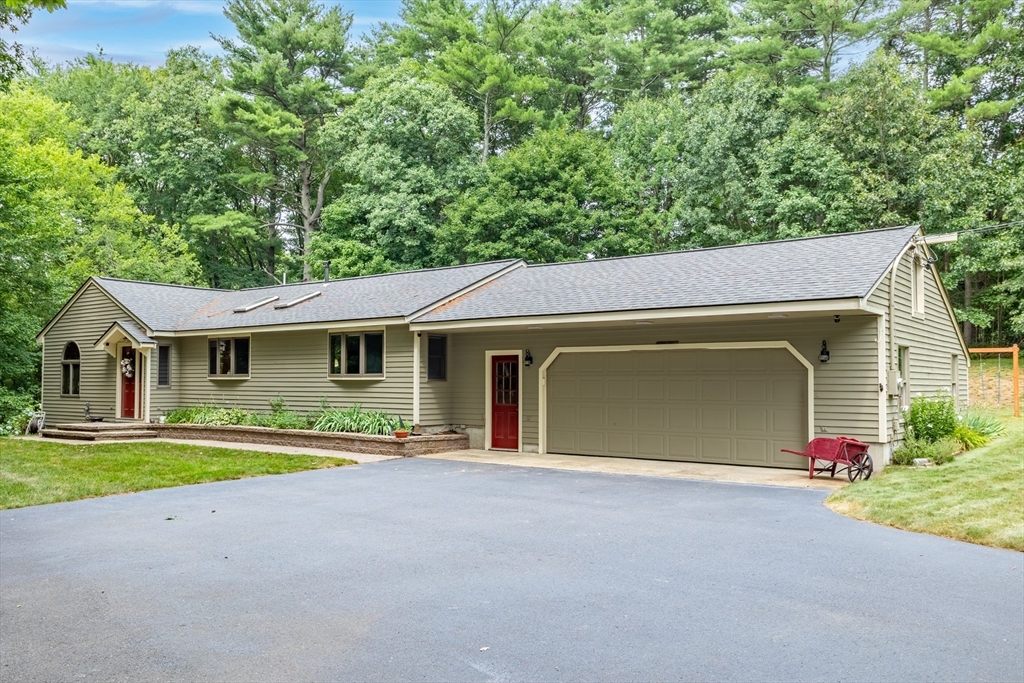 773 Great Road Stow, MA 01775 - Photo 37 of 37 front view of a house with a yard