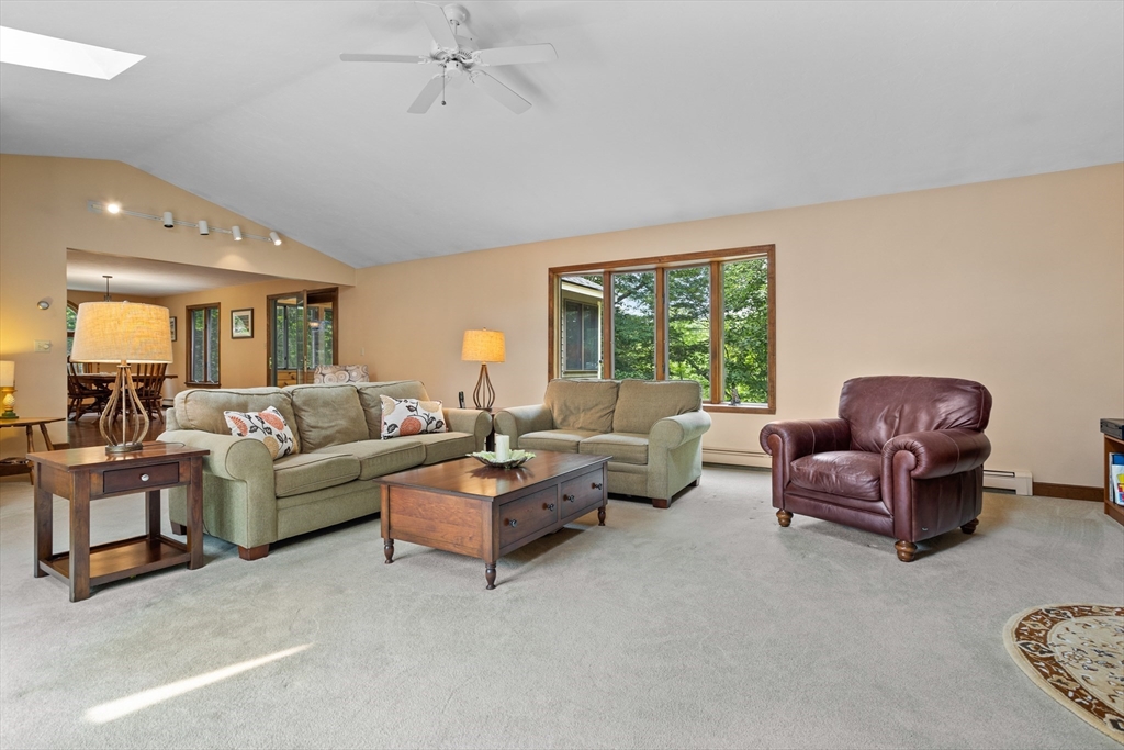 773 Great Road Stow, MA 01775 - Photo 5 of 37 a living room with furniture and a large window