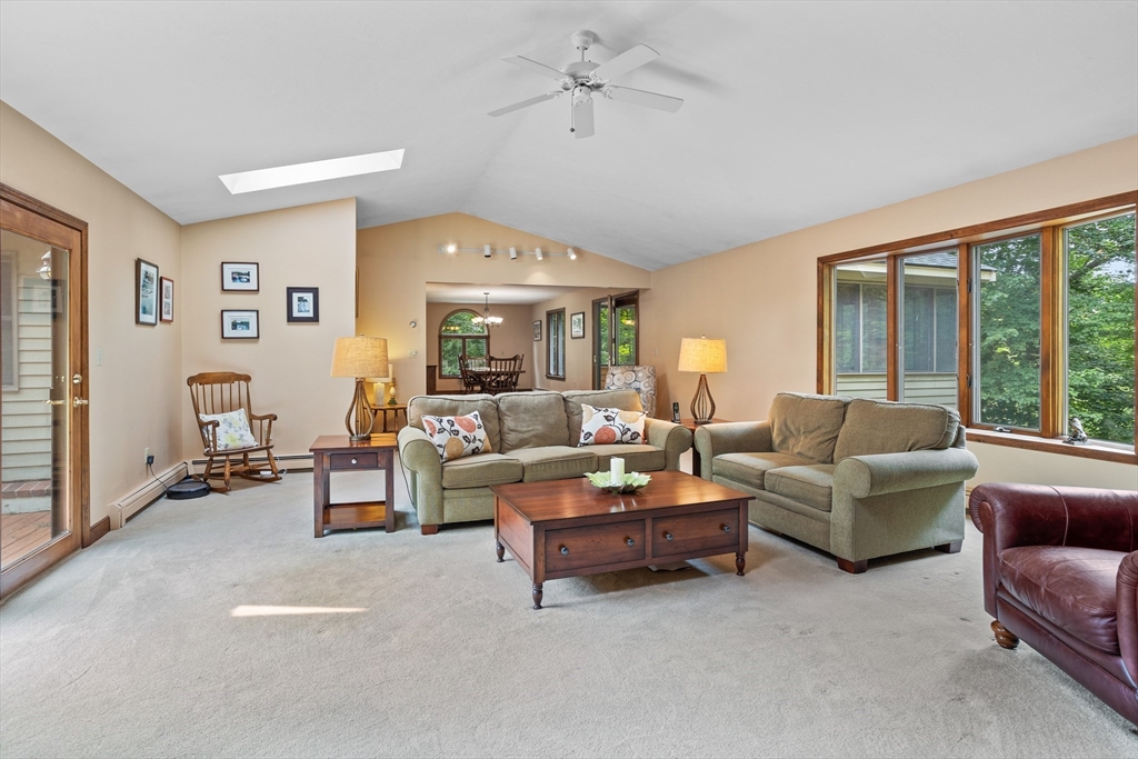 773 Great Road Stow, MA 01775 - Photo 6 of 37 a living room with furniture and a large window