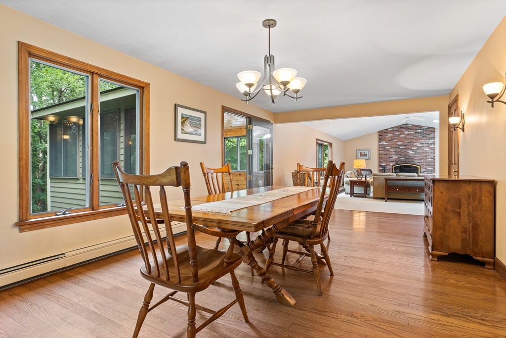 773 Great Road Stow, MA 01775 - Photo 9 of 37 a view of a dining room with furniture window and wooden floor