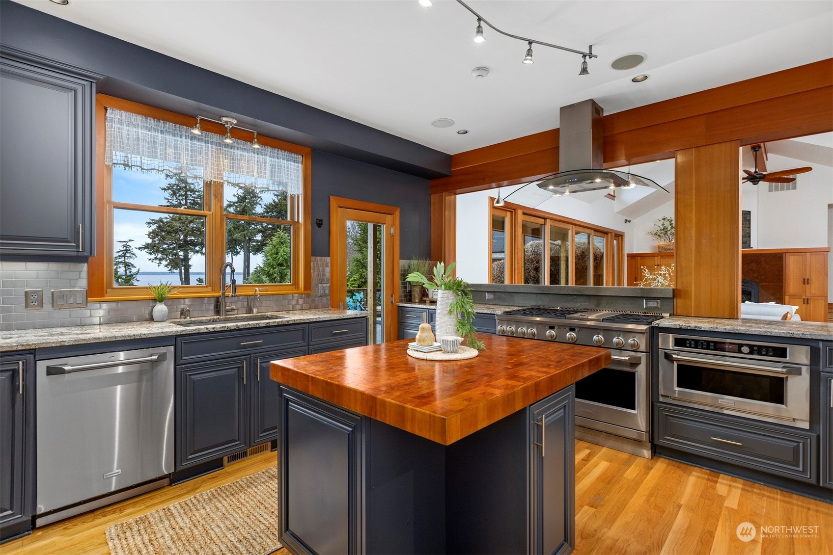 804 Fieldston Road Bellingham, WA 98225 - Photo 15 of 40 a kitchen with stainless steel appliances granite countertop stove top oven and cabinets