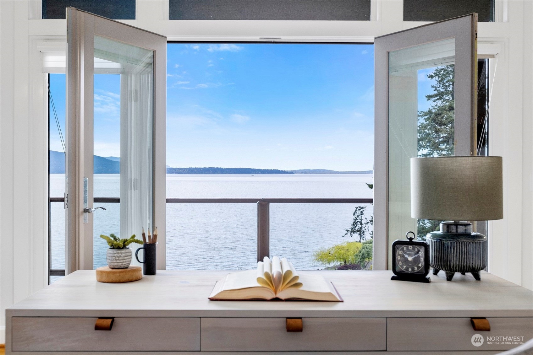 804 Fieldston Road Bellingham, WA 98225 - Photo 17 of 40 a kitchen with a sink and a potted plant