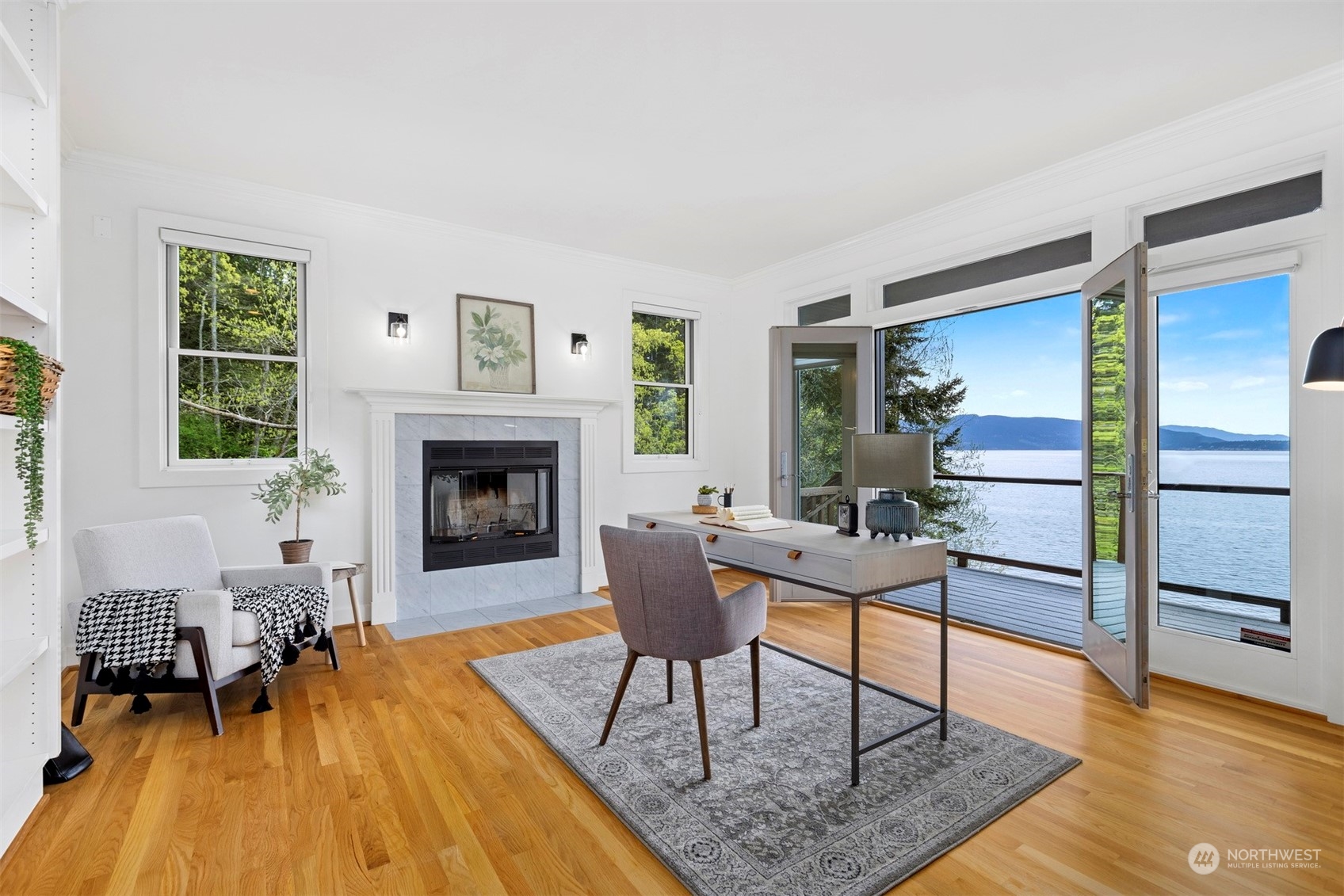 804 Fieldston Road Bellingham, WA 98225 - Photo 18 of 40 a living room with furniture and a fireplace