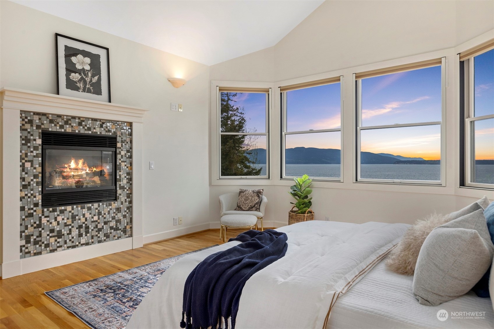 804 Fieldston Road Bellingham, WA 98225 - Photo 20 of 40 a bedroom with a bed and wooden floor