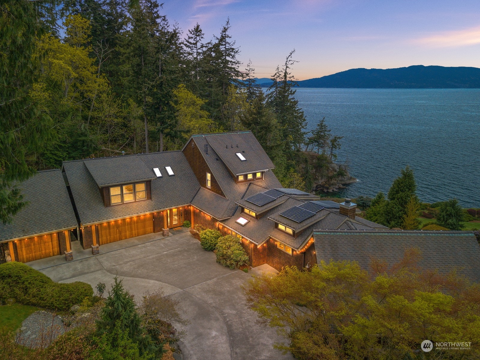 804 Fieldston Road Bellingham, WA 98225 - Photo 2 of 40 an aerial view of a house with outdoor space and a lake view