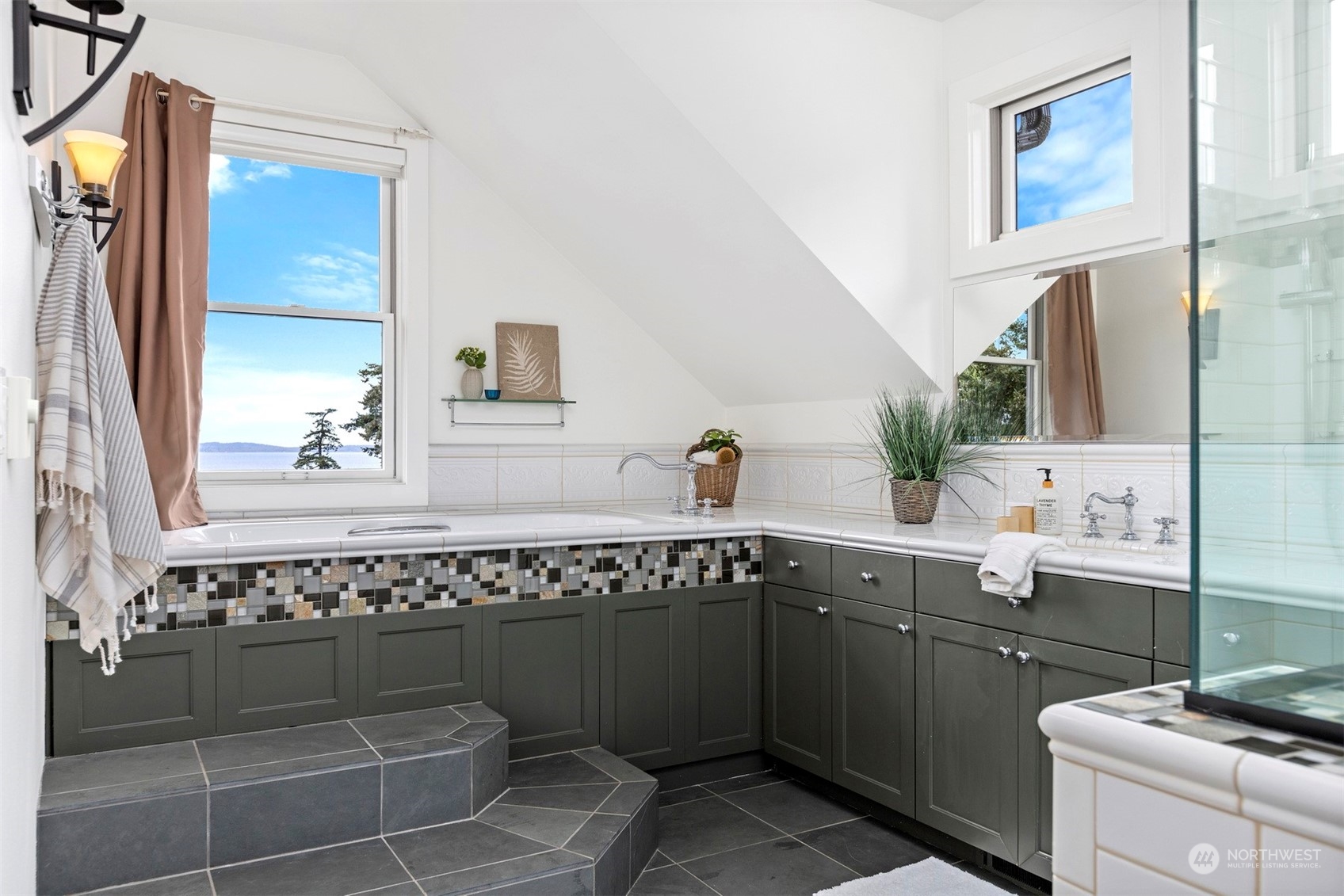 804 Fieldston Road Bellingham, WA 98225 - Photo 22 of 40 a bathroom with a sink and a mirror