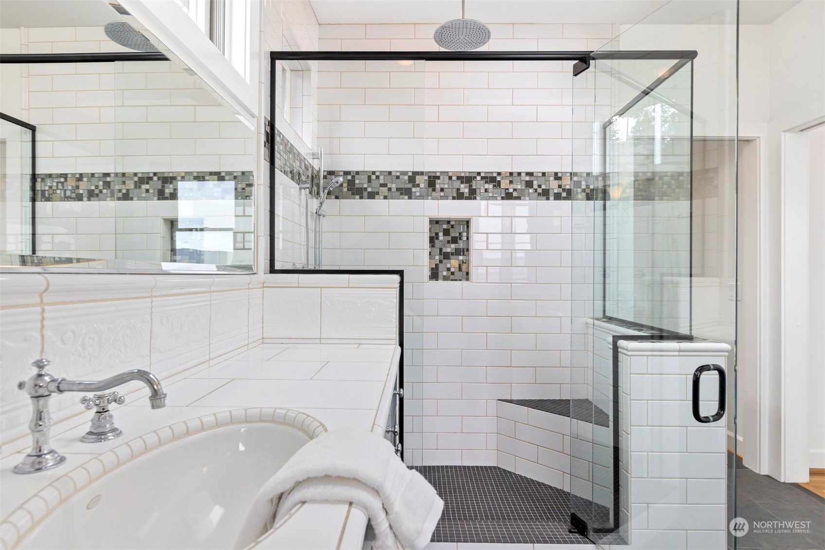 804 Fieldston Road Bellingham, WA 98225 - Photo 23 of 40 a bathroom with a granite countertop shower a mirror and a sink