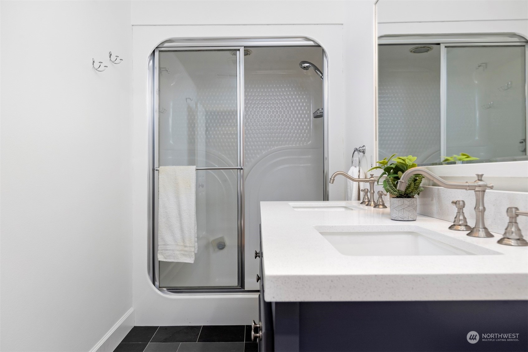 804 Fieldston Road Bellingham, WA 98225 - Photo 31 of 40 a bathroom with a sink and a mirror
