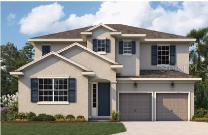 5379 Nickerbean Street Apopka, FL 32712 - Photo 1 of 1 a front view of a house with a yard