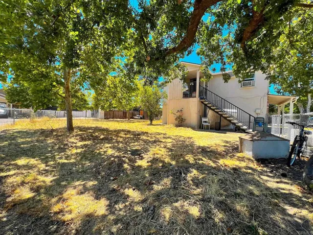 a view of yard with trees