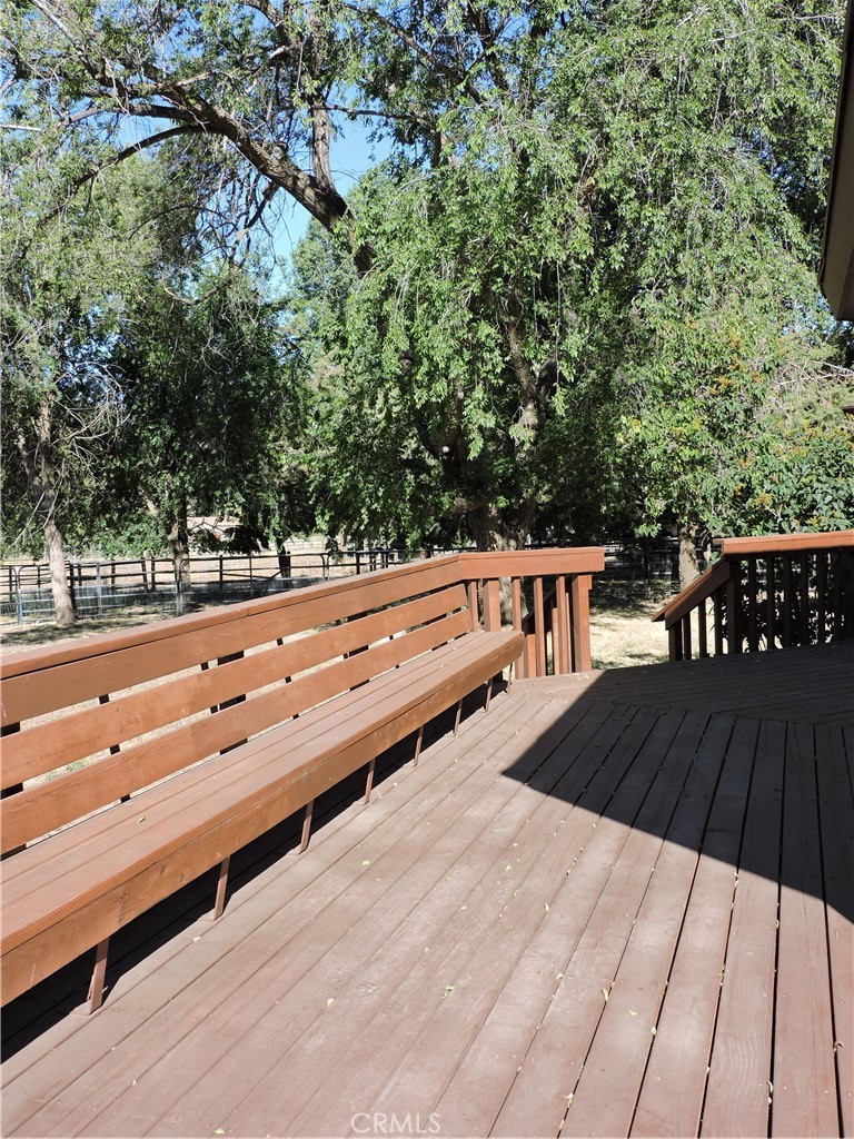 26931 Columbia Way Tehachapi, CA 93561 - Photo 15 of 49 Nice large built-in bench on the deck.