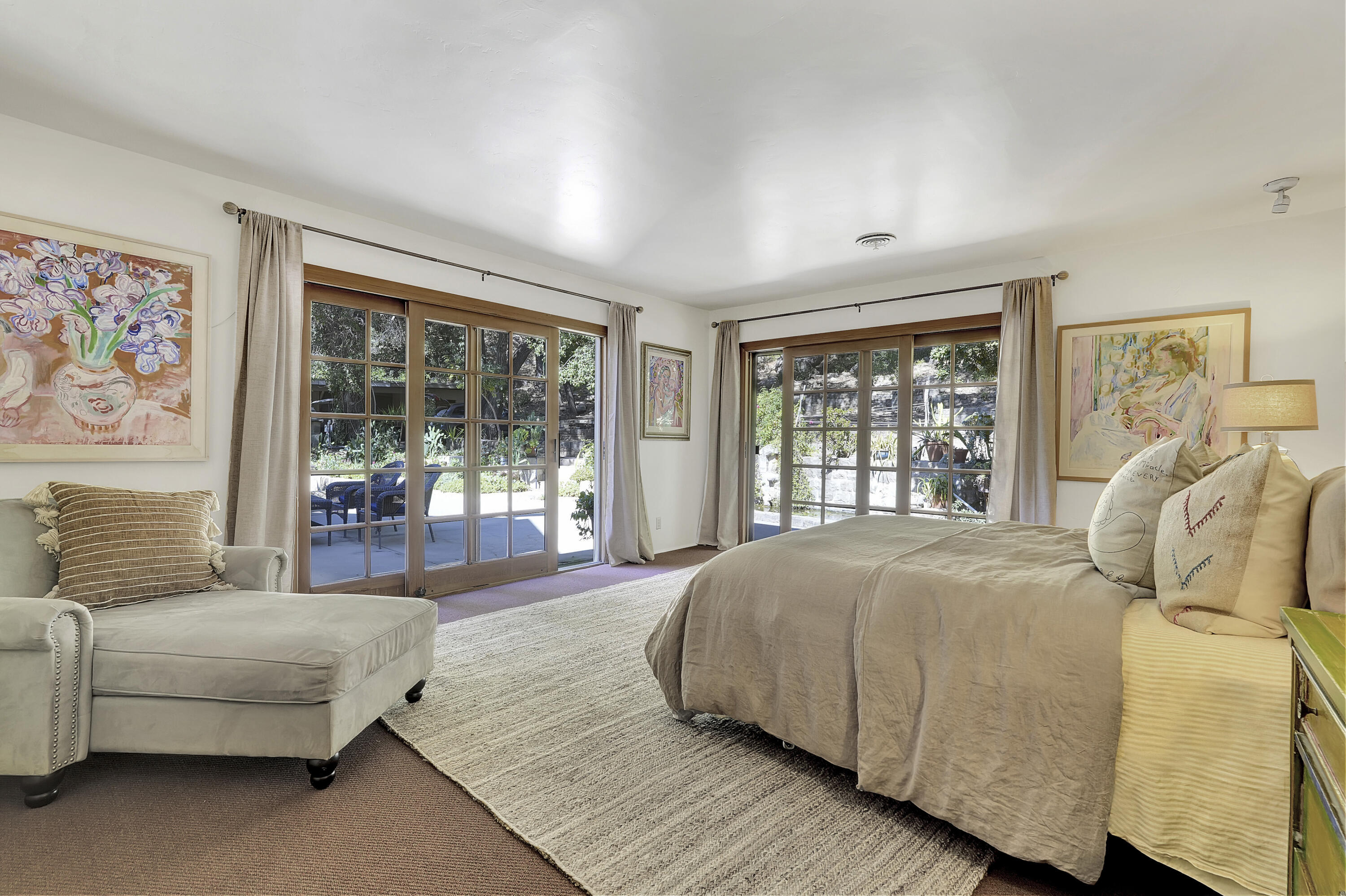 12615 Koenigstein Road Santa Paula, CA 93060 - Photo 19 of 40 a bedroom with a bed and a large window