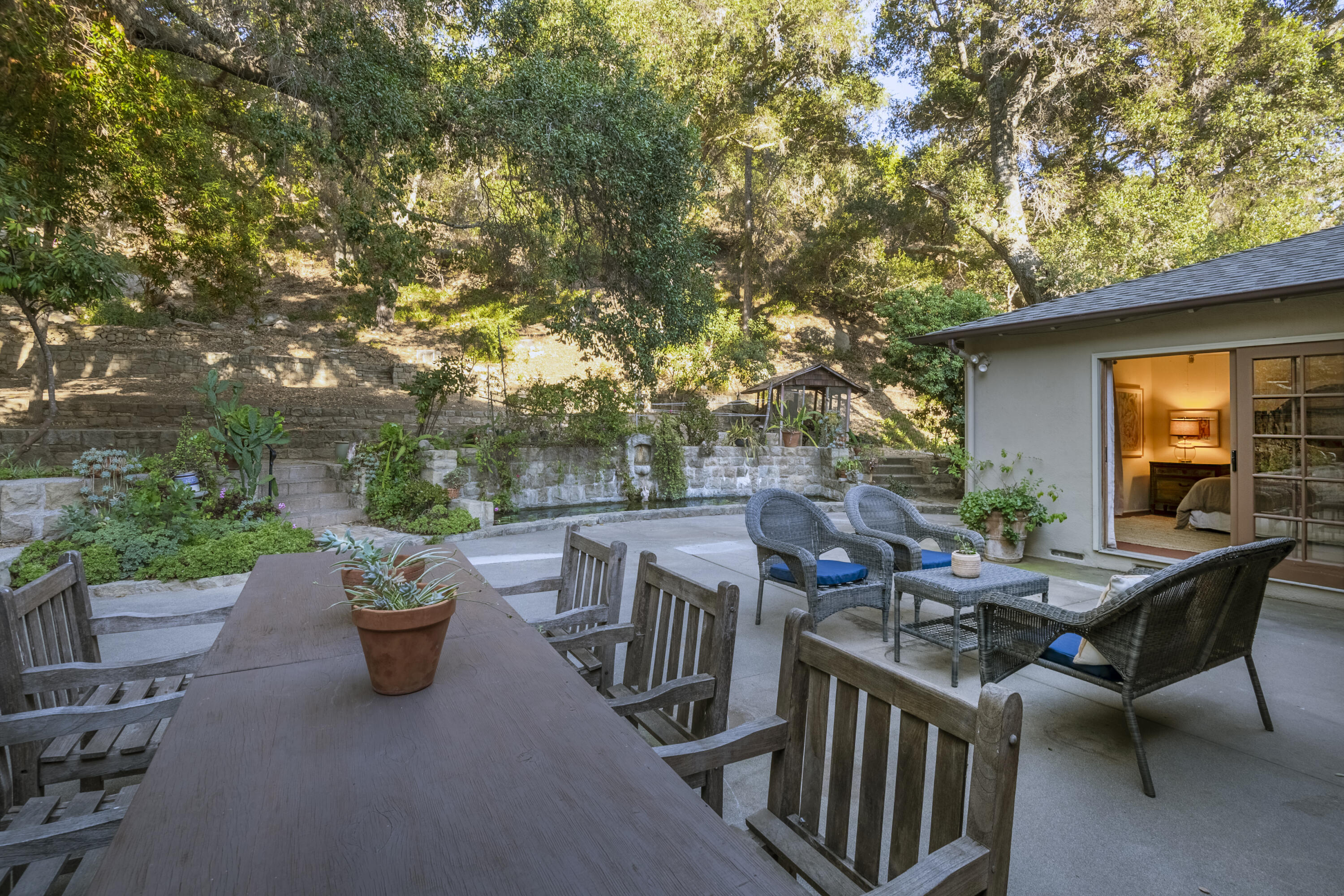 12615 Koenigstein Road Santa Paula, CA 93060 - Photo 30 of 40 a view of a patio with a table and chairs