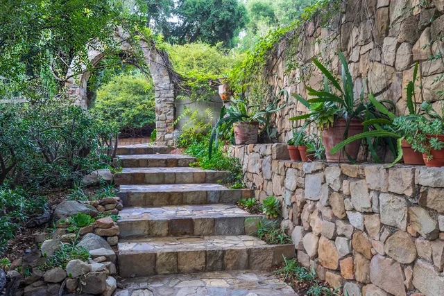 a view of statue in a garden