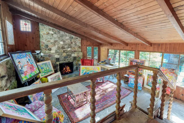 a view of a yard with a tree