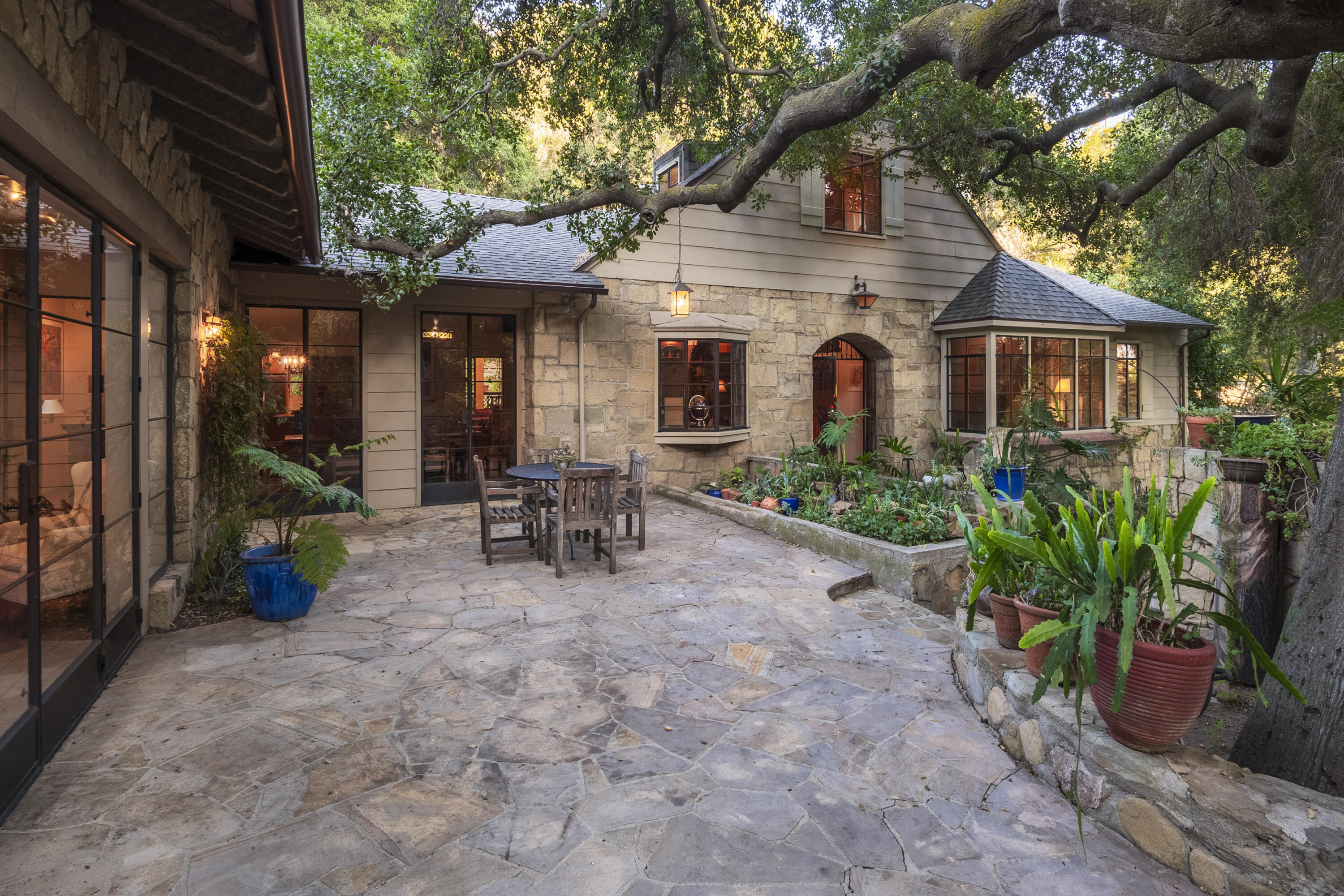 12615 Koenigstein Road Santa Paula, CA 93060 - Photo 5 of 40 a view of a chairs and table in a backyard