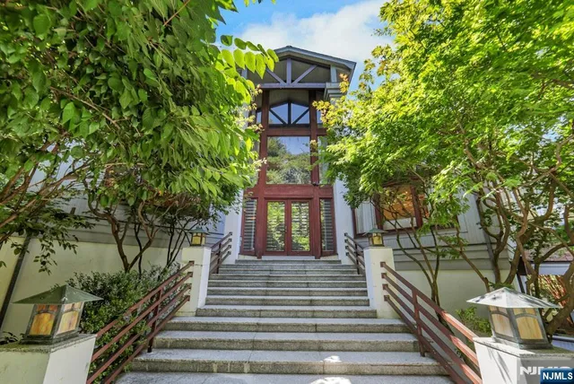 a view of a brick building with large windows