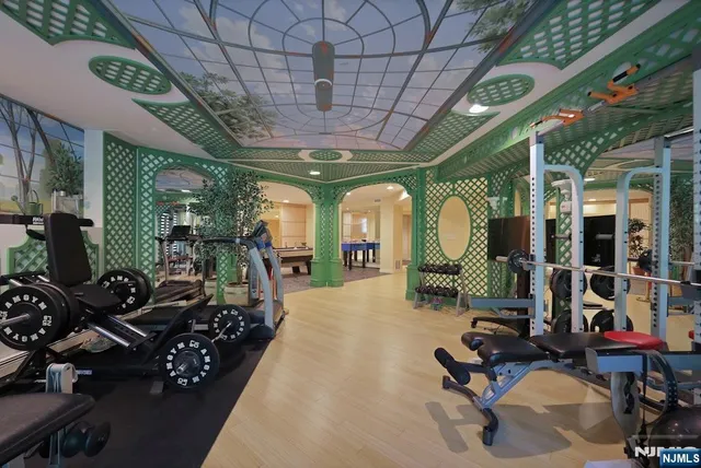 a room with lots of furniture and white walls