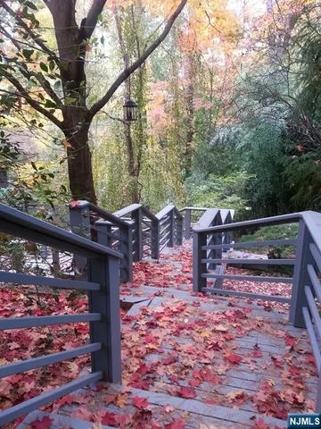 a view of a bench in a backyard