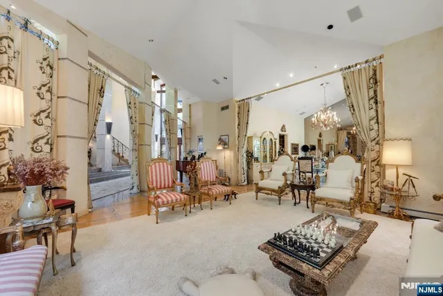 a living room with furniture and a table