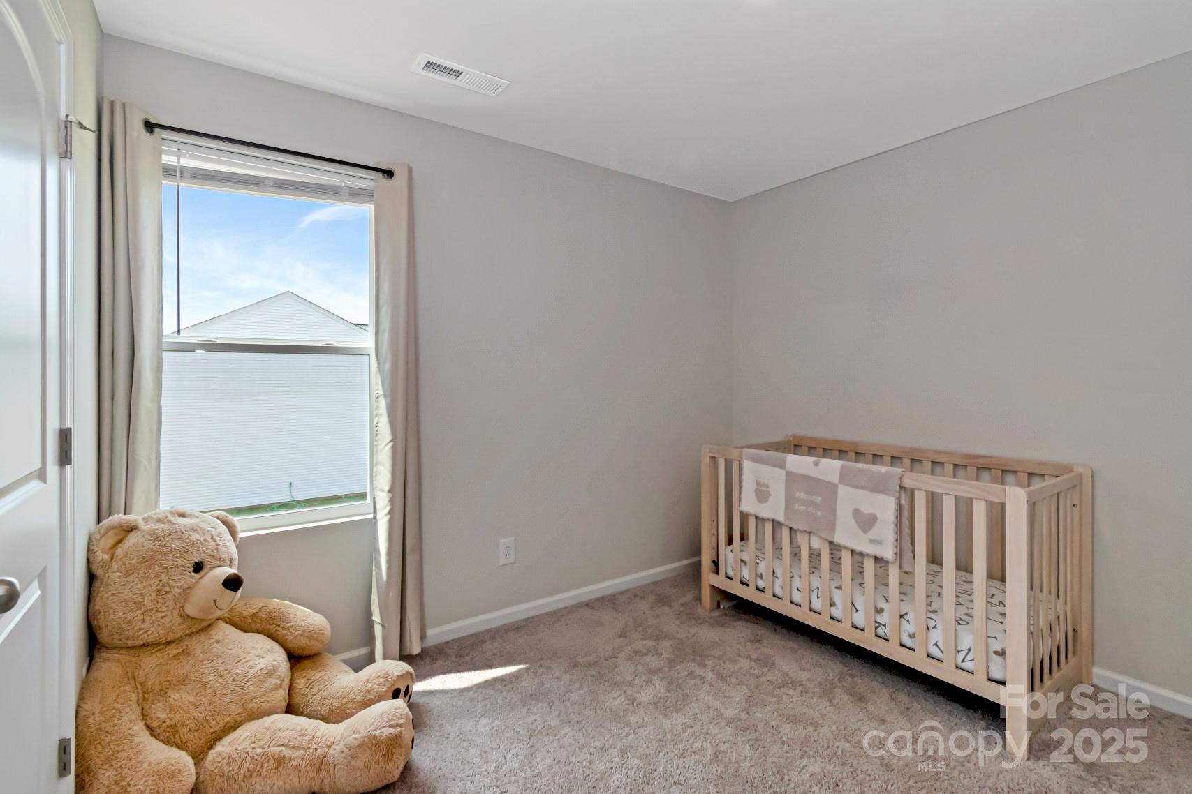 3305 Rian Drive Lenoir, NC 28645 - Photo 23 of 40 a bedroom with a bed and a window