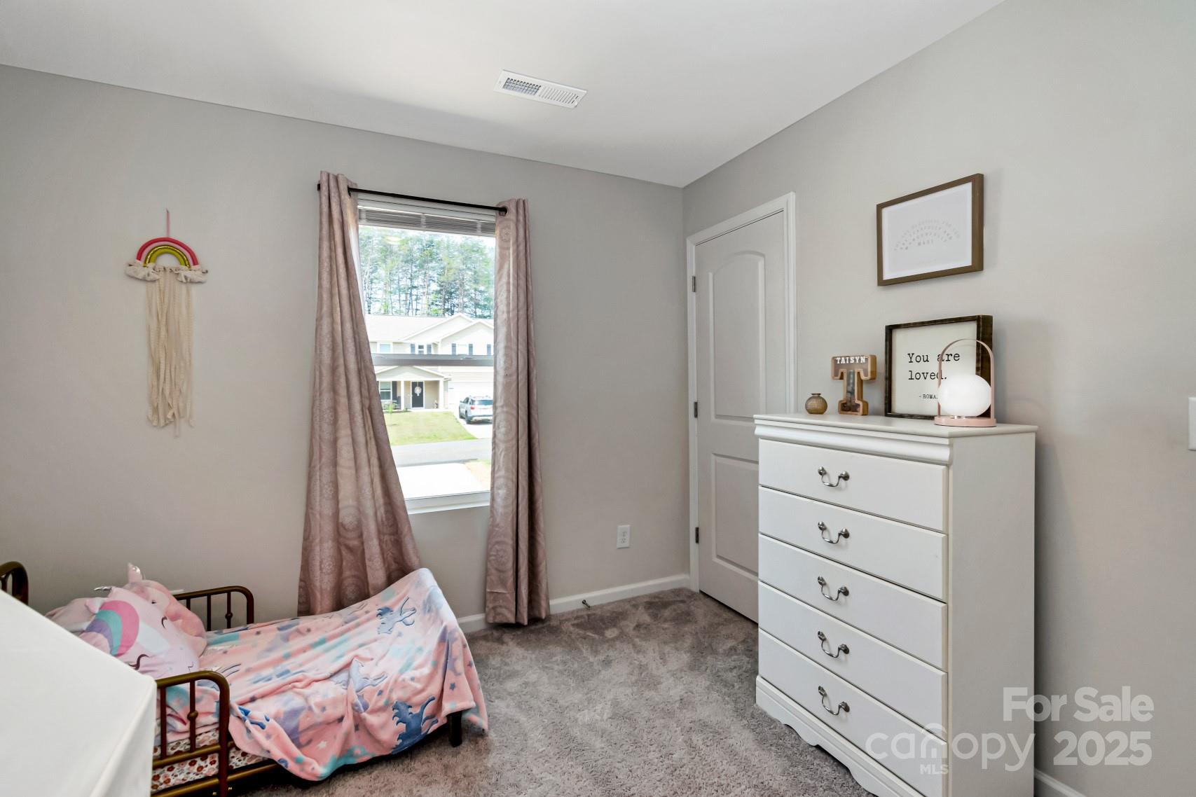 3305 Rian Drive Lenoir, NC 28645 - Photo 25 of 40 a bedroom with a bed and a window