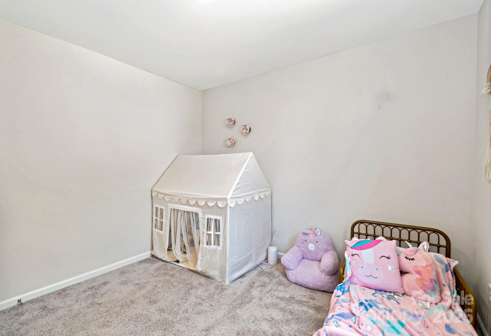 3305 Rian Drive Lenoir, NC 28645 - Photo 26 of 40 a bedroom with a bed and hallway