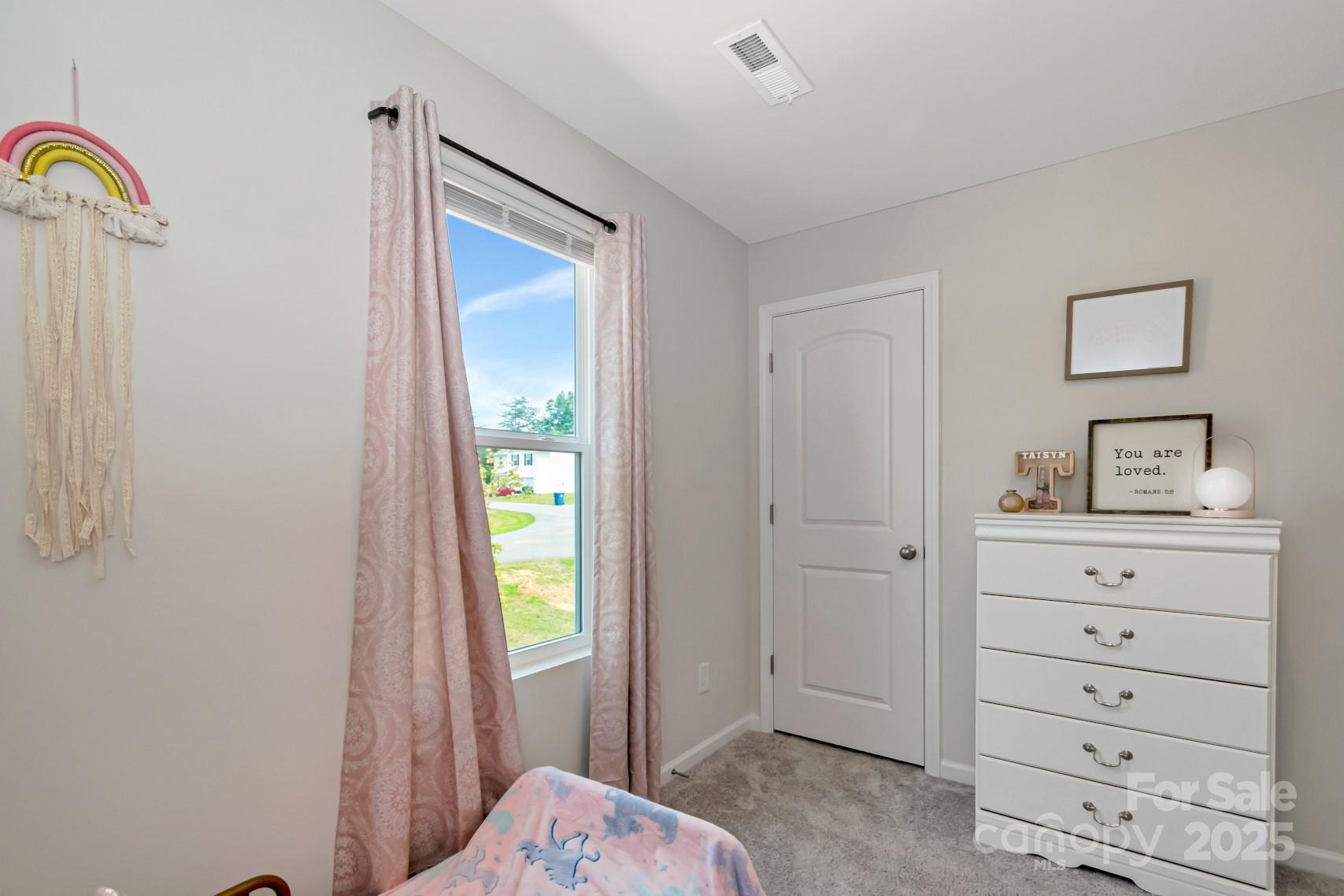 3305 Rian Drive Lenoir, NC 28645 - Photo 27 of 40 a bedroom with a bed and a window