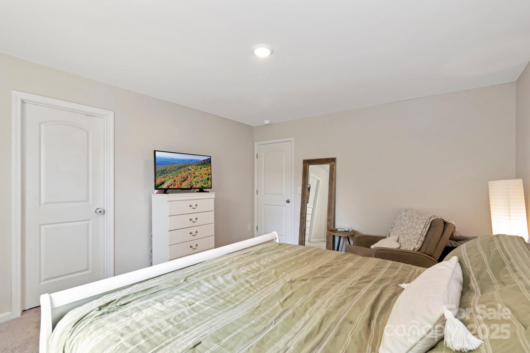 3305 Rian Drive Lenoir, NC 28645 - Photo 30 of 40 a bedroom with a bed and a dresser