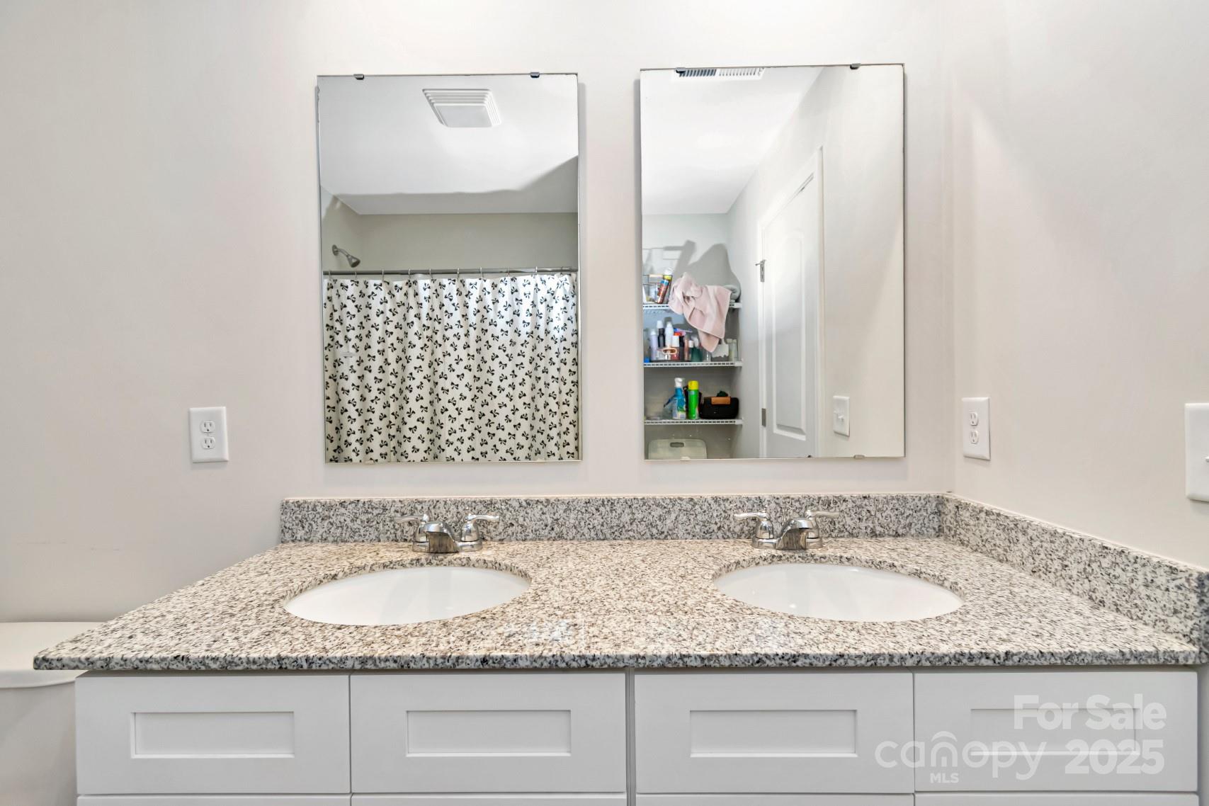 3305 Rian Drive Lenoir, NC 28645 - Photo 34 of 40 a bathroom with a granite countertop sink and a mirror