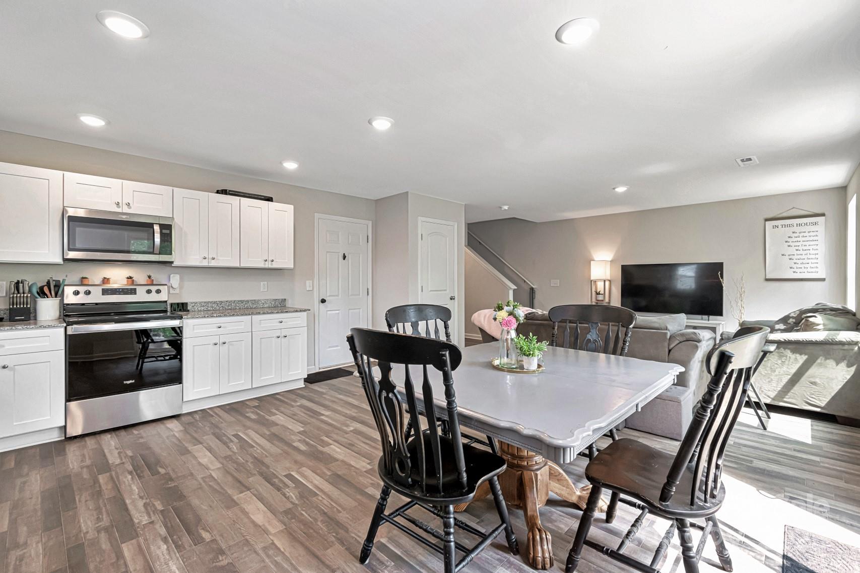 3305 Rian Drive Lenoir, NC 28645 - Photo 6 of 40 a view of kitchen with cabinets table and chairs