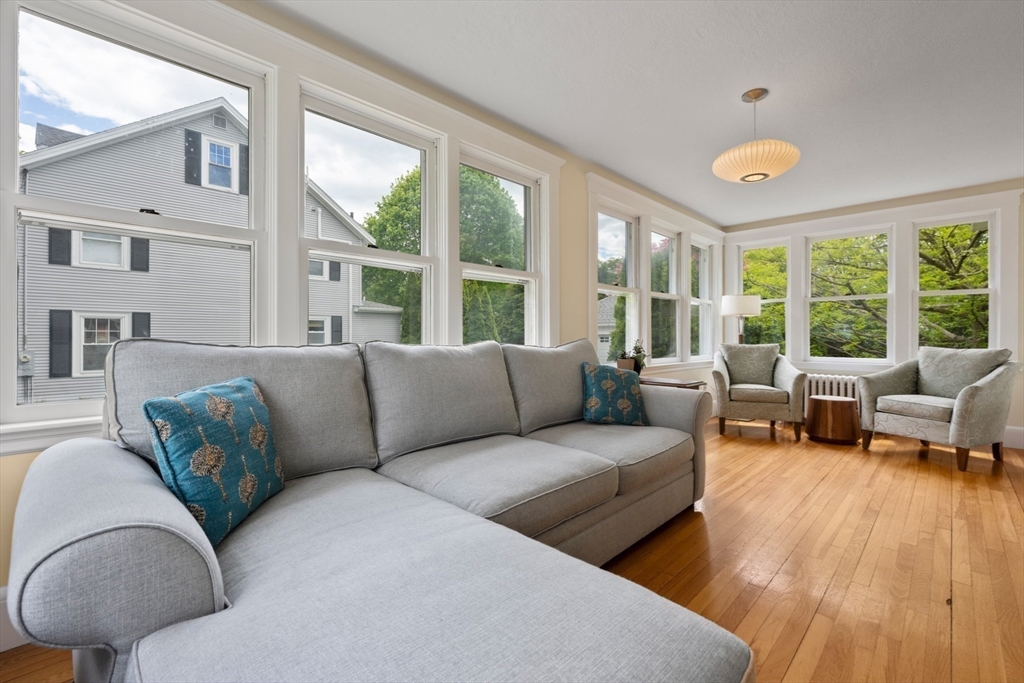 8 Charlotte Road Marblehead, MA 01945 - Photo 8 of 37 a living room with furniture and a large window