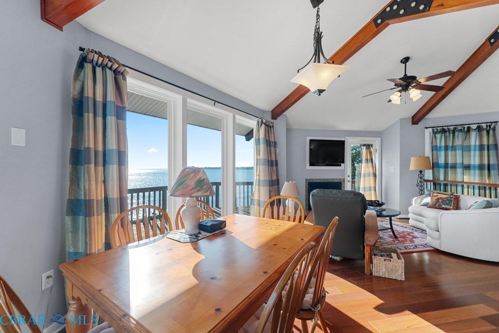 24 River Road Lottsburg, VA 22511 - Photo 23 of 35 a view of a dining room with furniture window and wooden floor