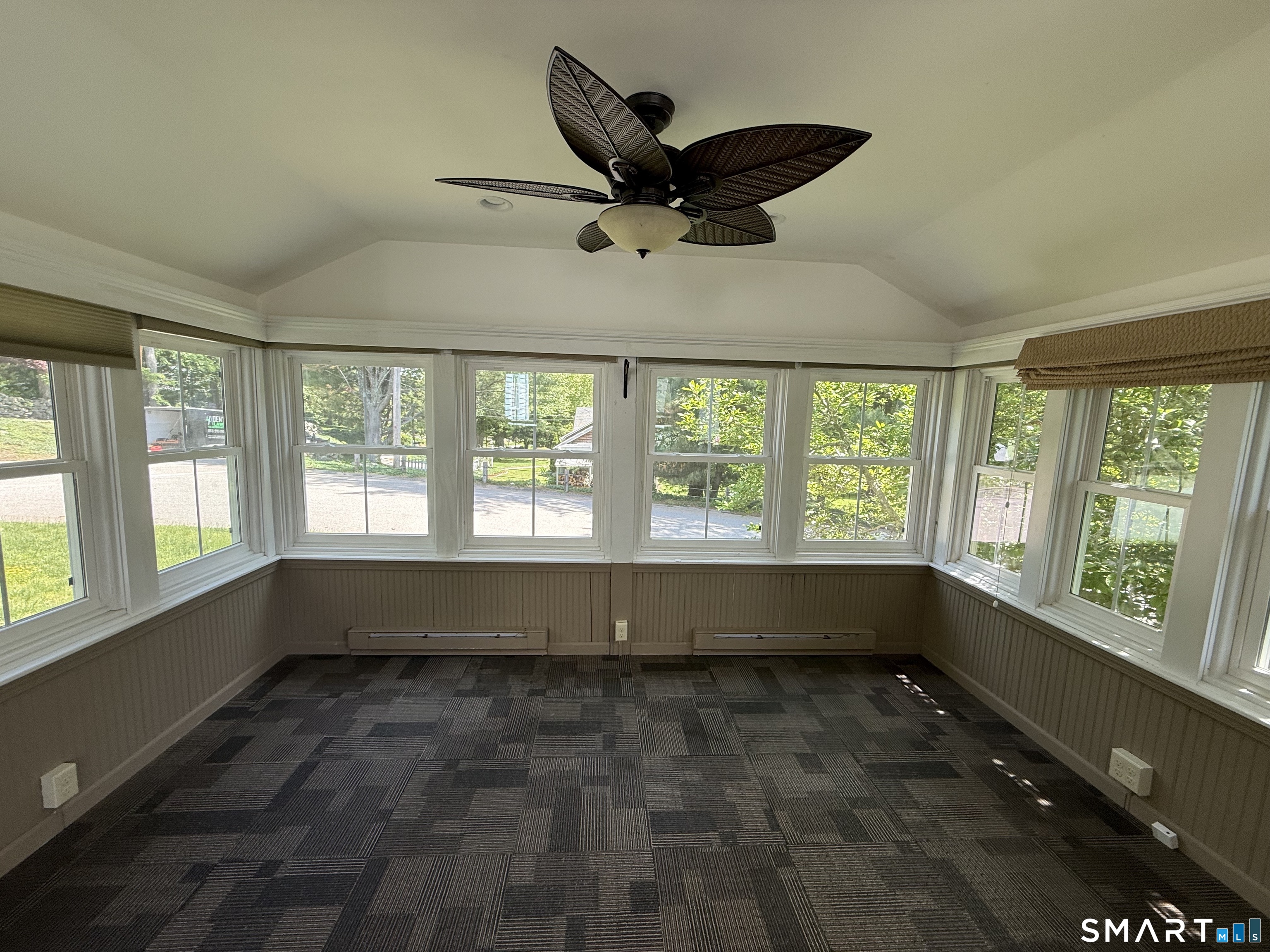 312 Ferry Road Old Lyme, CT 06371 - Photo 6 of 16 a view of an empty room with a window