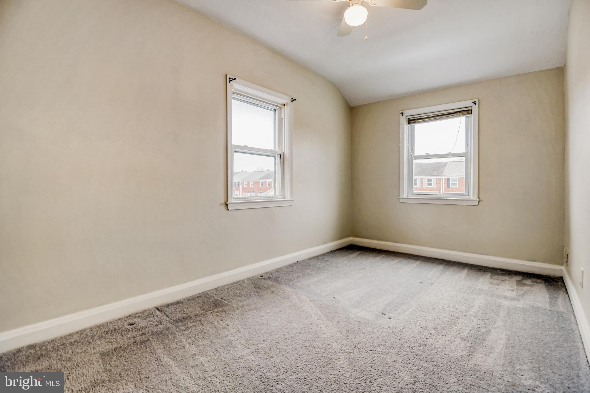 946 Middlesex Road Essex, MD 21221 - Photo 11 of 22 an empty room with windows
