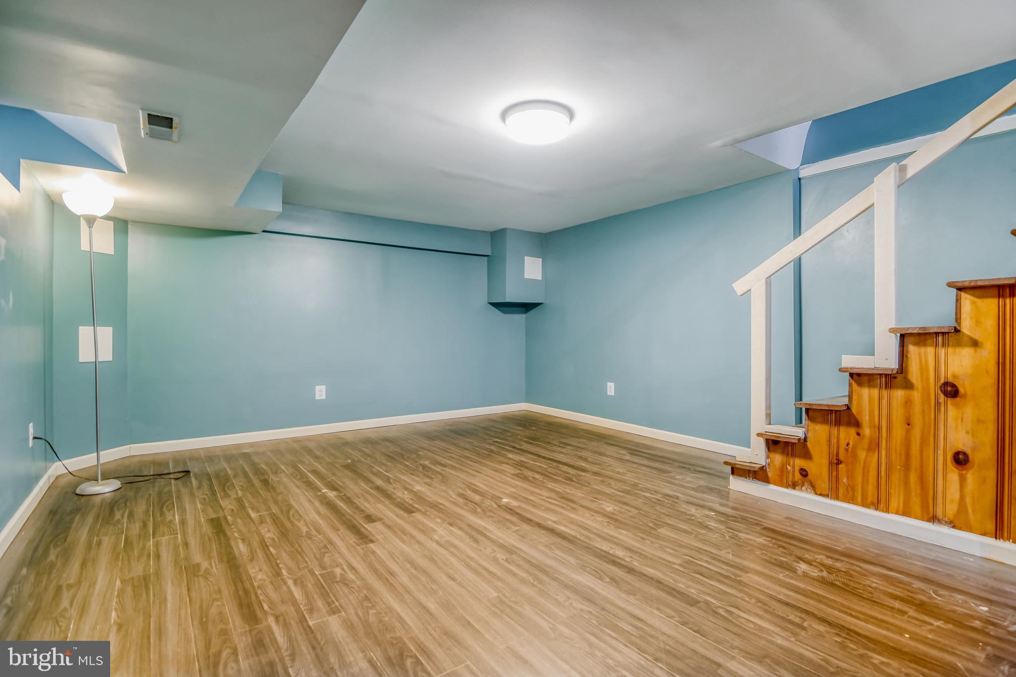 946 Middlesex Road Essex, MD 21221 - Photo 18 of 22 a view of a room with wooden floor