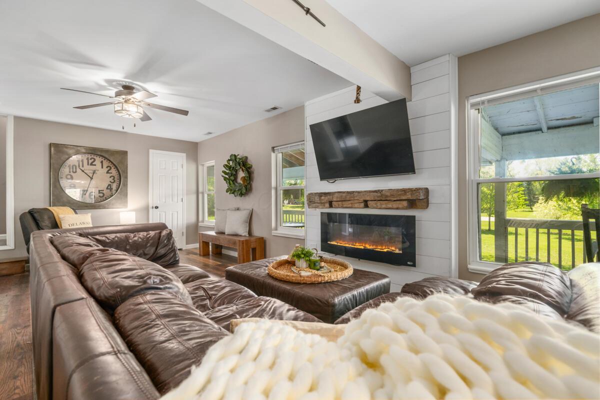 2522 Bean-Oller Road Delaware, OH 43015 - Photo 25 of 93 Gas fireplace with hand hewn wood mantel