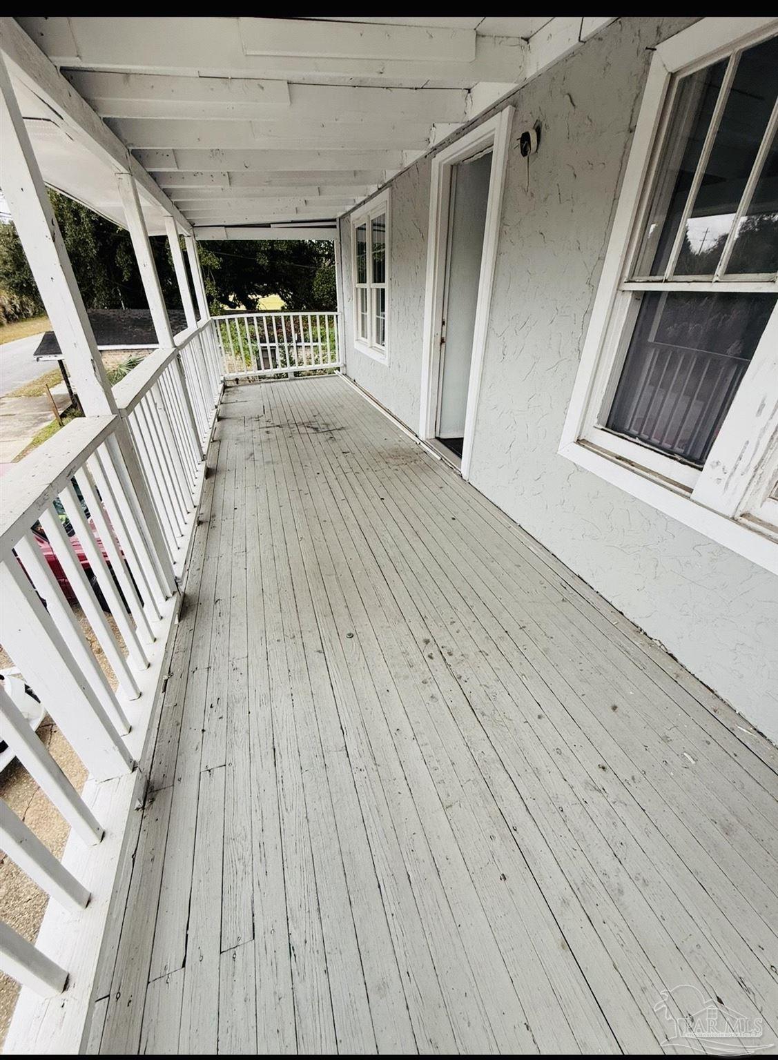 2901 North Hayne Street Pensacola, FL 32503 - Photo 9 of 11 a view of deck with wooden floor and staircase