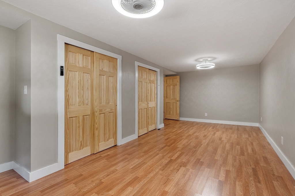 34 Morse Road Royalston, MA 01368 - Photo 31 of 42 a view of an empty room with wooden floor and a window