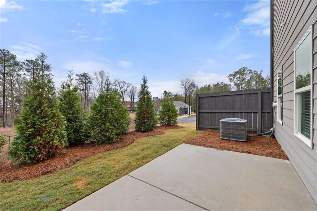 277 Epping Street, Unit 79 Stockbridge, GA 30281 - Photo 31 of 49 a view of a backyard with green space