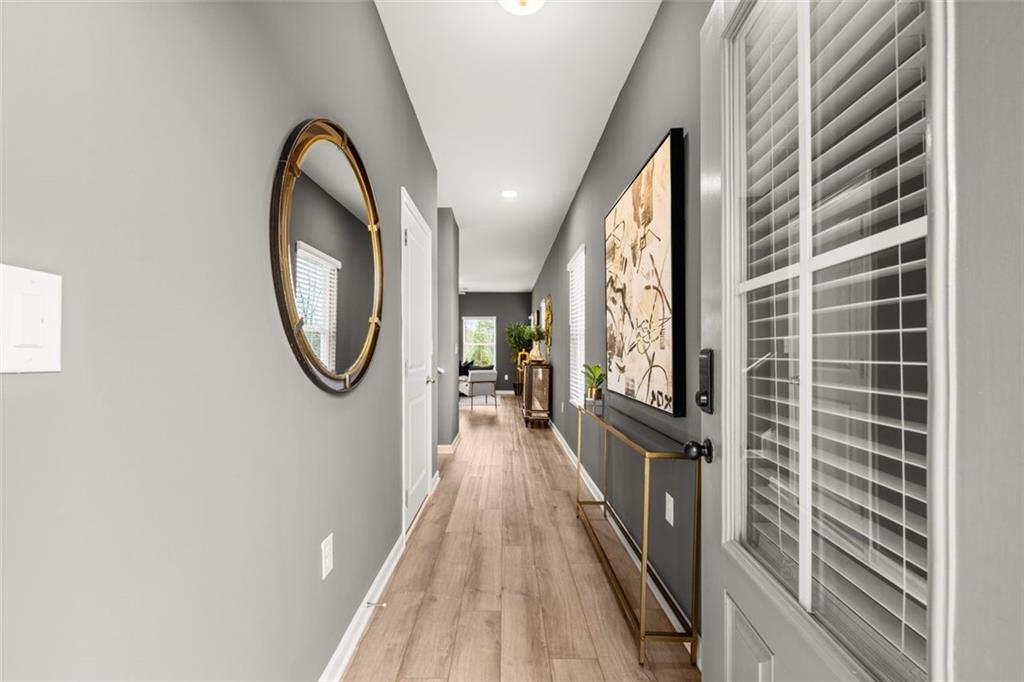 277 Epping Street, Unit 79 Stockbridge, GA 30281 - Photo 8 of 49 a view of a entryway door with wooden floor