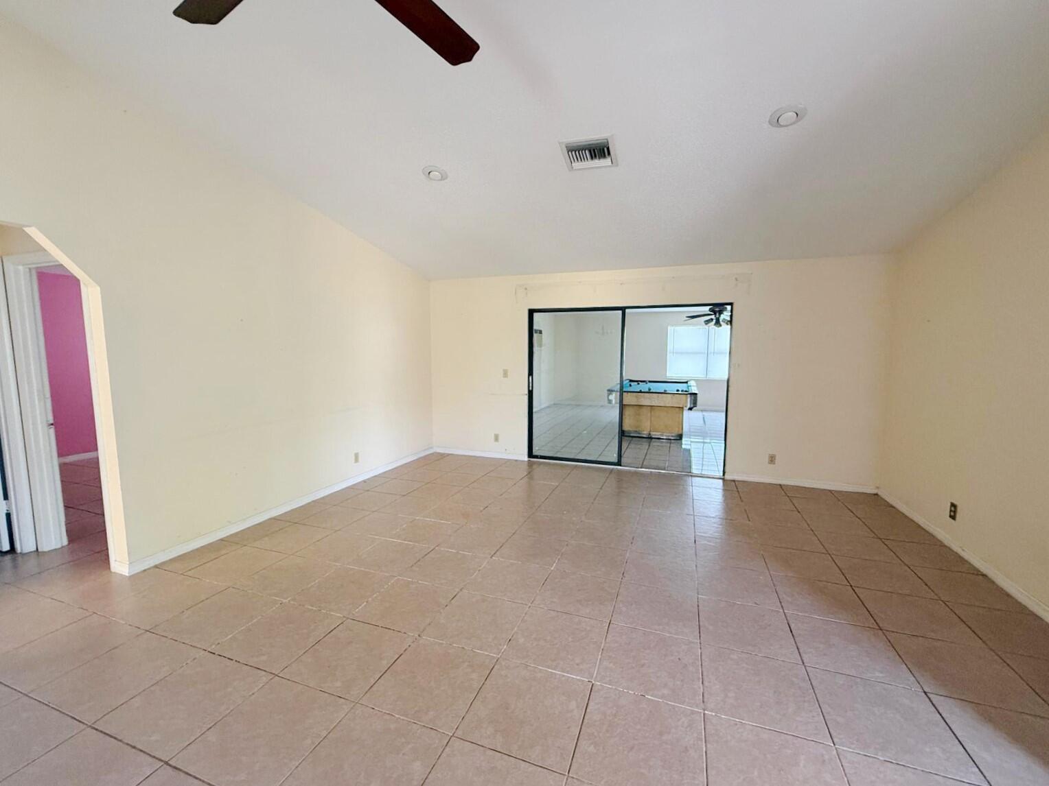 2361 Southeast 27th Street Okeechobee, FL 34974 - Photo 11 of 31 a view of empty room with wooden floor