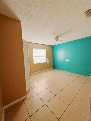 a view of a room with windows