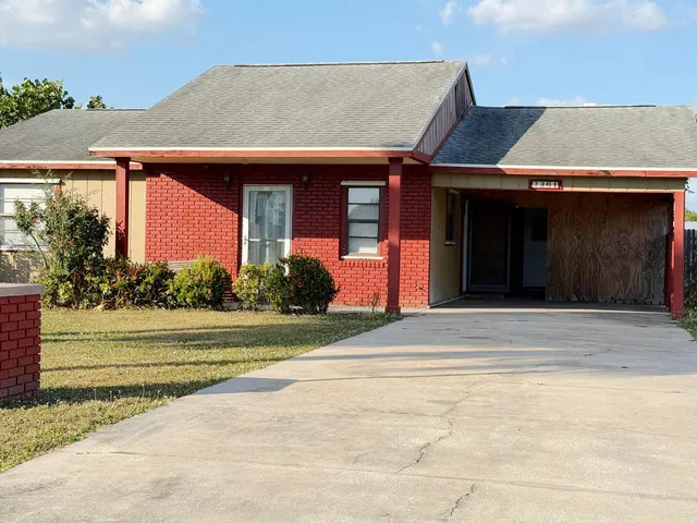 a view of a house with a swimming pool