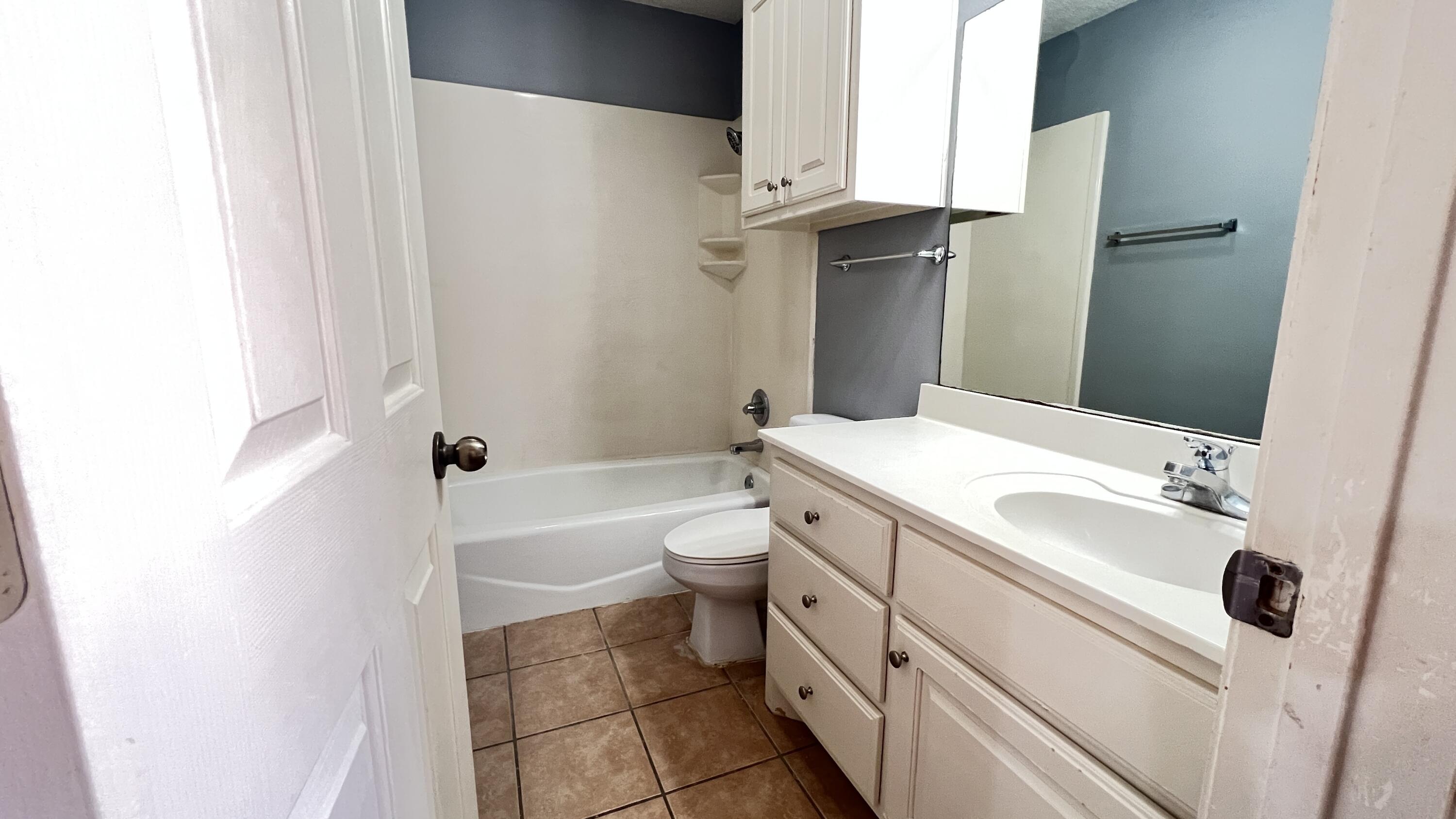 3102 110th Street, Unit B Lubbock, TX 79423 - Photo 5 of 9 IMG_4039